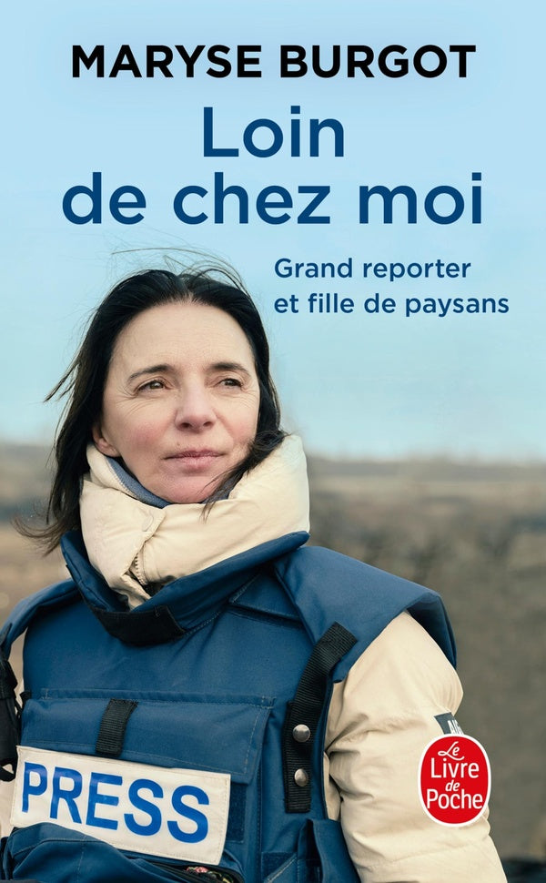 Front cover of Loin de chez moi : Grand reporter et fille de paysans